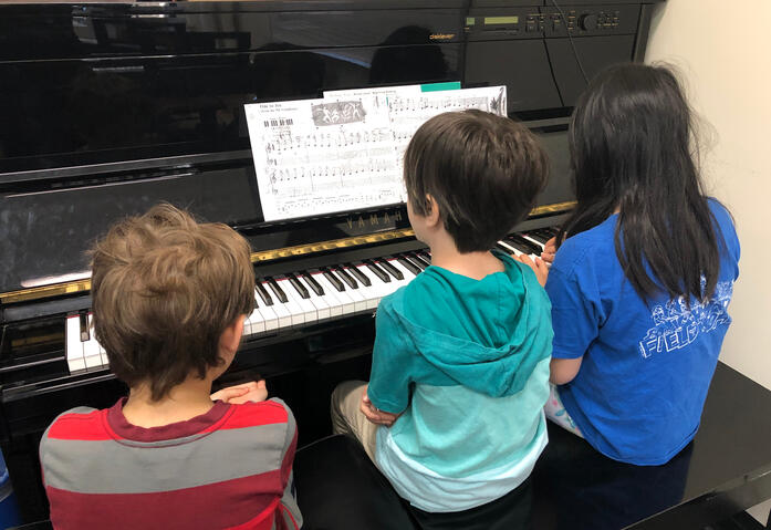 Children with piano