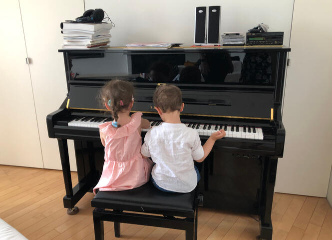 Children playing piano